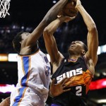 Phoenix Suns' Wesley Johnson (2) has his shot blocked by Oklahoma City Thunder's Hasheem Thabeet, of Tanzania, during the second half in an NBA basketball game, Sunday, Feb. 10, 2013, in Phoenix. The Thunder won 97-69. (AP Photo/Ross D. Franklin)
