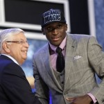 NBA Commissioner David Stern, left, shakes hands with Indiana's Victor Oladipo, who was selected second overall by the Orlando Magic in the first round of the NBA basketball draft, Thursday, June 27, 2013, in New York. (AP Photo/Kathy Willens)