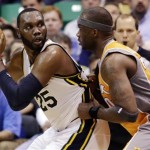 Phoenix Suns' Jermaine O'Neal, right, guards Utah Jazz's Al Jefferson (25) in the second quarter during an NBA basketball game, Wednesday, March 27, 2013, in Salt Lake City. (AP Photo/Rick Bowmer)