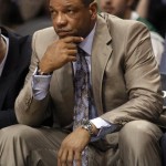Boston Celtics coach Doc Rivers watches game action against the Phoenix Suns in the first half of an NBA basketball game, Friday, Feb. 22, 2013, in Phoenix. (AP Photo/Paul Connors)