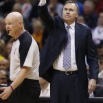 Los Angeles Lakers head coach Mike D'Antoni signals to his team against the Phoenix Suns during the first half of an NBA basketball game, Wednesday, Jan. 30, 2013, in Phoenix. (AP Photo/Matt York)