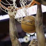 Houston Rockets' Thomas Robinson dunks during the fourth quarter of an NBA basketball game against the Phoenix Suns Wednesday, March 13, 2013, in Houston. (AP Photo/David J. Phillip)