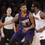 Phoenix Suns' Markieff Morris (11) is defended by New York Knicks' Amar'e Stoudemire (1) during the first half of an NBA basketball game, Monday, Jan. 13, 2014, in New York. (AP Photo/Frank Franklin II)