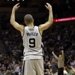 San Antonio Spurs' Tony Parker, of France, reacts to fans during the third quarter of an NBA basketball game against the Phoenix Suns, Saturday, Jan. 26, 2013, in San Antonio, Texas. San Antonio won 108-99. (AP Photo/Eric Gay)
