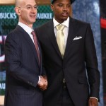 NBA Deputy Commissioner Adam Silver, left, shakes hands with Providence's Ricky Ledo, who was selected by the Milwaukee Bucks in the second round of the NBA basketball draft, Thursday, June 27, 2013, in New York. (AP Photo/Jason DeCrow)