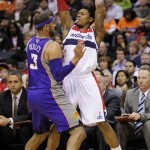 Washington Wizards guard Bradley Beal, right, looks to pass against Phoenix Suns guard Jared Dudley (3) during the second half of an NBA basketball game, Saturday, March 16, 2013, in Washington. The Wizards won 127-105. (AP Photo/Nick Wass)
