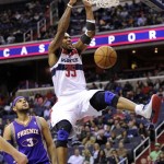 Washington Wizards forward Trevor Booker (35) dunks against Phoenix Suns guard Jared Dudley (3) during the second half of an NBA basketball game on Saturday, March 16, 2013, in Washington. The Wizards won 127-105. (AP Photo/Nick Wass)
