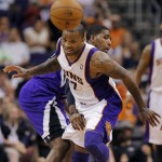 Phoenix Suns' P.J. Tucker (17) steals the ball from Sacramento Kings' Jason Thompson during the second half of an NBA basketball game, Thursday, March 28, 2013, in Phoenix. (AP Photo/Matt York)