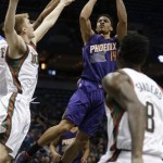 Phoenix Suns' Gerald Green (14) puts up a shot against the Milwaukee Bucks during the first half of an NBA basketball game Wednesday, Jan. 29, 2014, in Milwaukee. (AP Photo/Jeffrey Phelps)