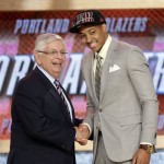 NBA Commissioner David Stern, left, shakes hands with Lehigh's C.J. McCollum, who was selected by the Portland Trail Blazers in the first round of the NBA basketball draft, Thursday, June 27, 2013, in New York. (AP Photo/Kathy Willens)
