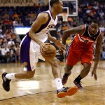 
Phoenix Suns' Wesley Johnson drives against Washington Wizards Martell Webster during the second half of an NBA basketball game, Wednesday, March 20, 2013, in Phoenix. The Wizards won 88-79. (AP Photo/Matt York)
