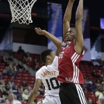 Miami Heat forward Eric Griffin (66) goes up for a dunk against Phoenix Suns' Diante Garrett in the third quarter of an NBA Summer League basketball game, Sunday, July 21, 2013, in Las Vegas. (AP Photo/Julie Jacobson)