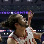 Chicago Bulls center Joakim Noah looks back and watches his shot score during the first half of an NBA basketball game against the Phoenix Suns Tuesday, Jan. 7, 2014, in Chicago. (AP Photo/Charles Rex Arbogast)