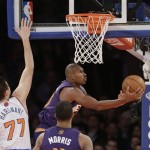 Phoenix Suns' Leandro Barbosa (10), of Brazil, drives past New York Knicks' Andrea Bargnani (77) during the first half of an NBA basketball game, Monday, Jan. 13, 2014, in New York. (AP Photo/Frank Franklin II)