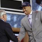 NBA Commissioner David Stern, left, shakes hands with Georgetown's Otto Porter Jr., who was selected third by the Washington Wizards in the first round of the NBA basketball draft, Thursday, June 27, 2013, in New York. (AP Photo/Kathy Willens)