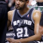 San Antonio Spurs' Tim Duncan sits on the bench during a timeout during the second half of an NBA basketball game, Friday, Feb. 21, 2014, in Phoenix. The Suns defeated the Spurs 106-85. (AP Photo/Ross D. Franklin)