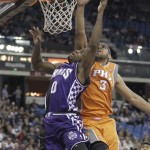 Sacramento Kings guard Toney Douglas, left, goes to the basket against Phoenix Suns guard Jared Dudley during the fourth quarter of an NBA basketball game in Sacramento, Calif., Friday, March 8, 2013. The Kings won 121-112. (AP Photo/Rich Pedroncelli)
