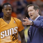 Phoenix Suns head coach Jeff Hornacek, right, talks with Archie Goodwin (20) during the second half of an NBA basketball game against the San Antonio Spurs, Friday, Feb. 21, 2014, in Phoenix. The Suns defeated the Spurs 106-85. (AP Photo/Ross D. Franklin)
