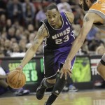 Sacramento Kings guard Marcus Thornton, left, drives past Phoenix Suns center Hamed Haddadi, of Iran, during the fourth quarter of an NBA basketball game in Sacramento, Calif., Friday, March 8, 2013. The Kings won 121-112. (AP Photo/Rich Pedroncelli)