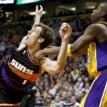 Phoenix Suns' Goran Dragic (1), of Slovenia, gets fouled by Los Angeles Lakers' Jodie Meeks in the second half of an NBA basketball game on Monday, March 18, 2013, in Phoenix. The Suns defeated the Lakers 99-76. (AP Photo/Ross D. Franklin)