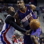 Phoenix Suns guard Leandro Barbosa (10) has the ball knocked away by Detroit Pistons guard Rodney Stuckey (3) while going to the basket during the first half of an NBA basketball game, Saturday, Jan. 11, 2014, in Auburn Hills, Mich. (AP Photo/Duane Burleson)