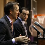 Jeff Hornacek, left, speaks during a news conference as as he is introduced as the Phoenix Suns new head coach, as general manager Ryan McDonough listens in, during a news conference on Tuesday, May 28, 2013, in Phoenix. (AP Photo/Ross D. Franklin)