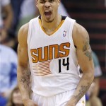  Phoenix Suns' Gerald Green shouts in celebration after scoring against the Indiana Pacers during the first half of an NBA basketball game, Wednesday, Jan. 22, 2014, in Phoenix. (AP Photo/Ross D. Franklin)