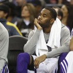 Sacramento Kings guard Marcus Thornton watches the closing moments of the Kings NBA basketball game against the Phoenix Suns in Sacramento, Calif., Wednesday, Jan. 23, 2013. The Suns won 106-96.(AP Photo/Rich Pedroncelli)