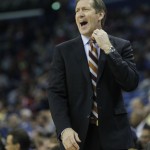 Phoenix Suns head coach Jeff Hornacek stands on the sideline against the New Orleans Pelicans in the first half of an NBA basketball game in New Orleans, Wednesday, April 9, 2014. (AP Photo/Bill Haber)