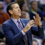 Phoenix Suns coach Jeff Hornacek calls for a timeout during the first half of the Suns' NBA basketball game against the Memphis Grizzlies, Wednesday, Nov. 5, 2014, in Phoenix. (AP Photo/Matt York)