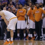 Phoenix Suns' Goran Dragic, of Slovenia, rests as his bench watches a free throw during the second half of an NBA basketball game against the Memphis Grizzlies, Monday, April 14, 2014, in Phoenix. The Grizzlies won 97-91. (AP Photo/Matt York)