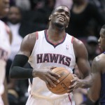 Atlanta Hawks forward Paul Millsap (4) reacts after he was called for an offensive foul in the second half of an NBA basketball game against the Phoenix Suns Monday, March 24, 2014, in Atlanta. Phoenix defeated Atlanta 102-95. (AP Photo/Jason Getz)