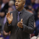 Denver Nuggets head coach Brian Shaw shouts instructions to his players during the first half of an NBA basketball game against the Phoenix Suns Wednesday, Nov. 26, 2014, in Phoenix. (AP Photo/Ross D. Franklin)