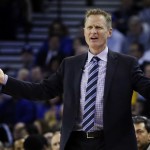 Golden State Warriors coach Steve Kerr gestures from the sideline during the first half of his team's NBA basketball game against the Phoenix Suns on Thursday, April 2, 2015, in Oakland, Calif. (AP Photo/Ben Margot)