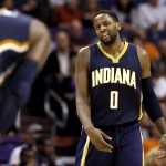 Indiana Pacers guard C.J. Miles (0) reacts to a foul call during the second half of an NBA basketball game against the Phoenix Suns, Tuesday, Dec. 2, 2014, in Phoenix. The Suns won 116-99. (AP Photo/Matt York)