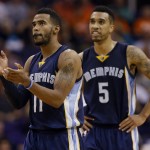 Memphis Grizzlies' Mike Conley (11) and Courtney Lee (5) react to a call against the Phoenix Suns during the second half of an NBA basketball game, Wednesday, Nov. 5, 2014, in Phoenix. Memphis won 102-91. (AP Photo/Matt York)
