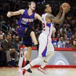 Los Angeles Clippers' Matt Barnes, right, controls the ball as Phoenix Suns' Gordan Dragic, left, defends during the first half of an NBA basketball game Saturday, Nov. 15, 2014, in Los Angeles. (AP Photo/Danny Moloshok)