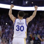Golden State Warriors' Stephen Curry (30) celebrates at the end of an NBA basketball game against the Phoenix Suns on Thursday, April 2, 2015, in Oakland, Calif. The Warriors won 107-106. (AP Photo/Ben Margot)