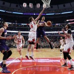 Phoenix Suns guard Gerald Green (14) looks to pass around Chicago Bulls forward Pau Gasol (16) during the first half of an NBA basketball game in Chicago, on Saturday, Feb. 21, 2015. (AP Photo/Jeff Haynes)