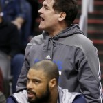 Dallas Mavericks owner Mark Cuban shouts at officials during the second half of an NBA basketball game against the Phoenix Suns, Tuesday, Dec. 23, 2014, in Phoenix. The Suns defeated the Mavericks 124-115. (AP Photo/Ross D. Franklin)
