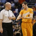 Phoenix Suns guard Goran Dragic, of Slovenia, talks with the referee during the first half of an NBA basketball game against the Charlotte Hornets, Friday, Nov. 14, 2014, in Phoenix. (AP Photo/Matt York)