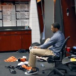  Phoenix Suns' Channing Frye laces up his shoe in the locker room after an NBA basketball game against the Memphis Grizzlies, Monday, April 14, 2014, in Phoenix. The Grizzlies won 97-91 eliminating the Suns from the playoffs. (AP Photo/Matt York)
