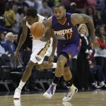 Phoenix Suns forward P.J. Tucker (17) steals the ball from New Orleans Pelicans forward Al-Farouq Aminu in the first half of an NBA basketball game in New Orleans, Wednesday, April 9, 2014. (AP Photo/Bill Haber)