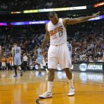  Phoenix Suns' P.J. Tucker acknowledges the Memphis Grizzlies bench during the final seconds of an NBA basketball game, Monday, April 14, 2014, in Phoenix. The Grizzlies won 97-91. (AP Photo/Matt York)