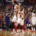 Chicago Bulls guard Aaron Brooks (0) reacts after making a three point basket against the Phoenix Suns during the second half of an NBA basketball game in Chicago, on Saturday, Feb. 21, 2015. The Bulls won the game 112-107. (AP Photo/Jeff Haynes)