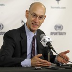 NBA commissioner Adam Silver talks to the media before an NBA basketball game between the Charlotte Hornets and the Phoenix Suns in Charlotte, N.C., Wednesday, Dec. 17, 2014. (AP Photo/Chuck Burton)