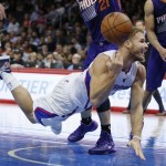 Los Angeles Clippers' Blake Griffin tosses the ball after being called for traveling against the Phoenix Suns during the second half of an NBA basketball game Saturday, Nov. 15, 2014, in Los Angeles. The Clippers won 120-107. (AP Photo/Danny Moloshok)