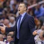  Memphis Grizzlies' head coach David Joerger yells to the referee's during the first half of an NBA basketball game against the Phoenix Suns, Monday, April 14, 2014, in Phoenix. (AP Photo/Matt York)