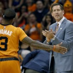 Phoenix Suns coach Jeff Hornacek applauds his team during the first half of an NBA basketball game against the Sacramento Kings, Friday, Nov. 7, 2014, in Phoenix. The Kings won 114-112 in double overtime. (AP Photo/Matt York)