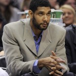 San Antonio Spurs forward Tim Duncan sits on the bench during the first half of an NBA basketball game against the Phoenix Suns on Friday, April 11, 2014, in San Antonio. (AP Photo/Darren Abate)

